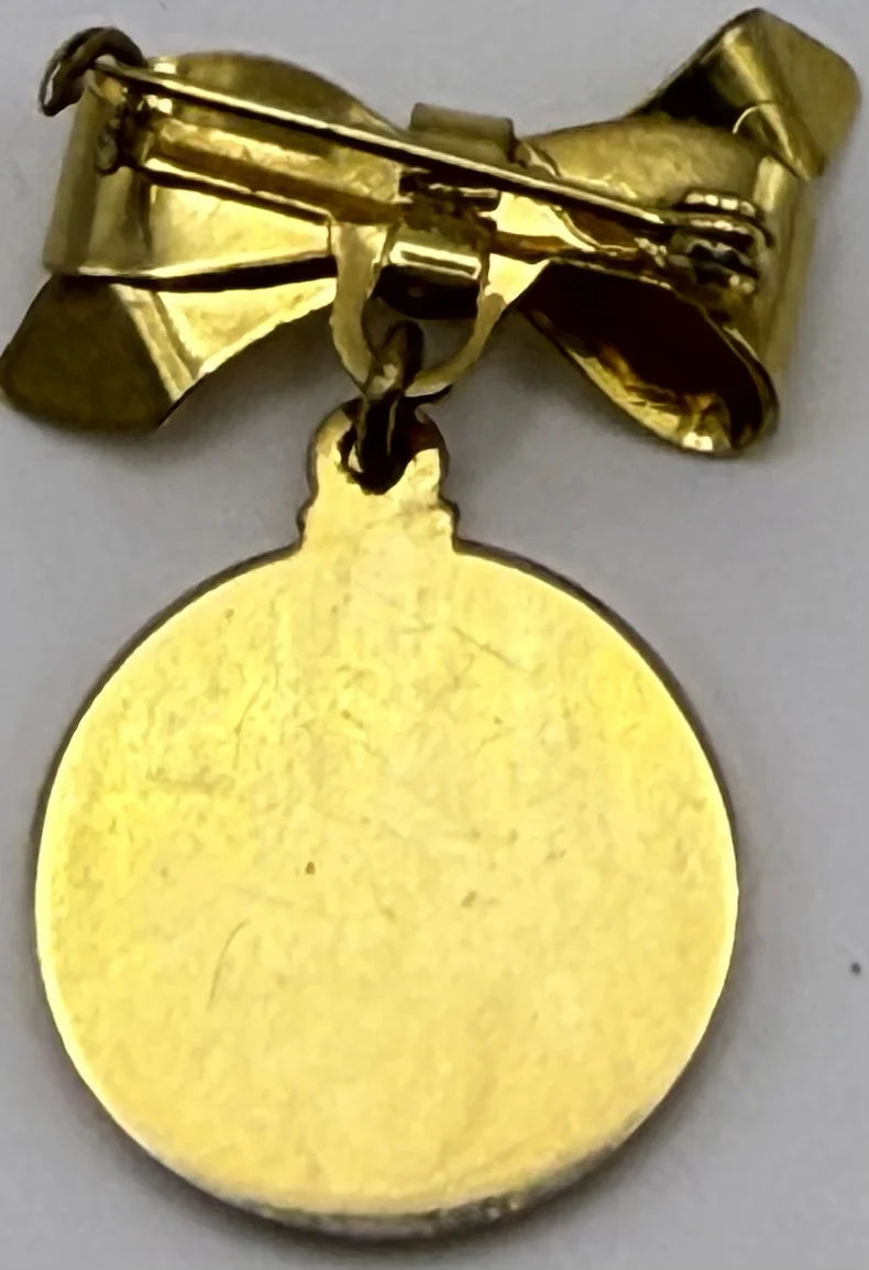 images/emblem_lapel_pin_rear.webp