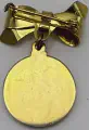 images/emblem_lapel_pin_rear.webp
