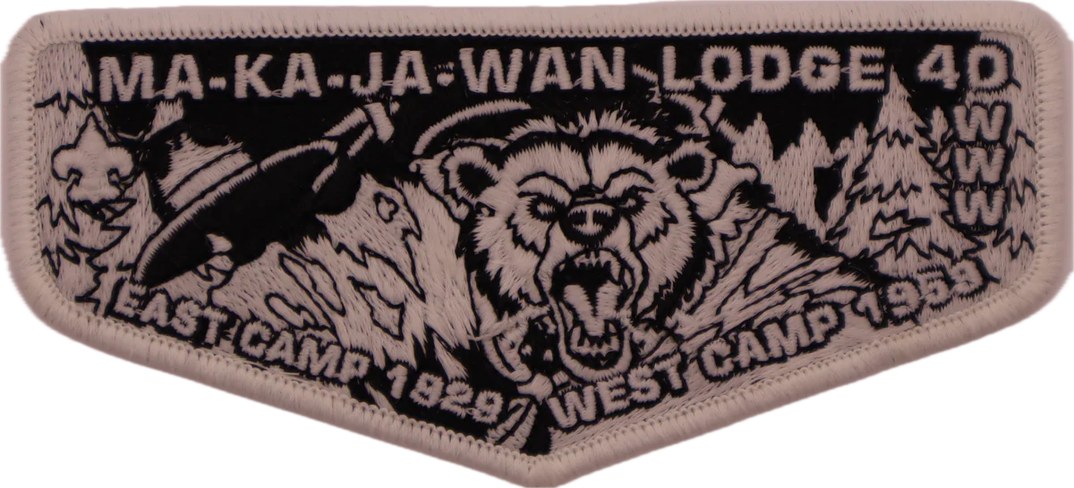 images/2025_legend_of_the_makajabear_glow_in_the_dark_lodge_flap_front_noglow.webp