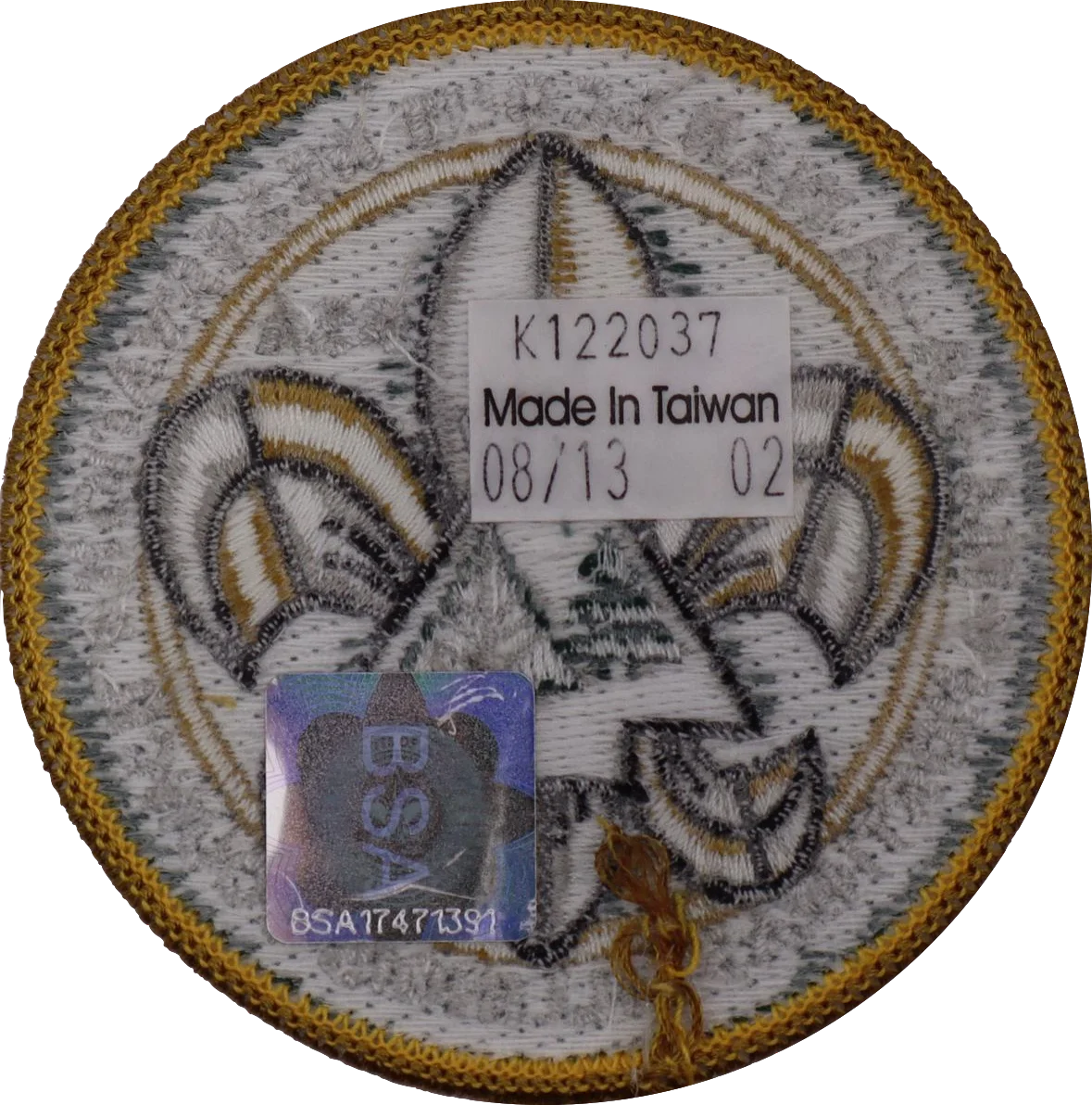 images/fleur_de_lis_silver_gold_rear.webp